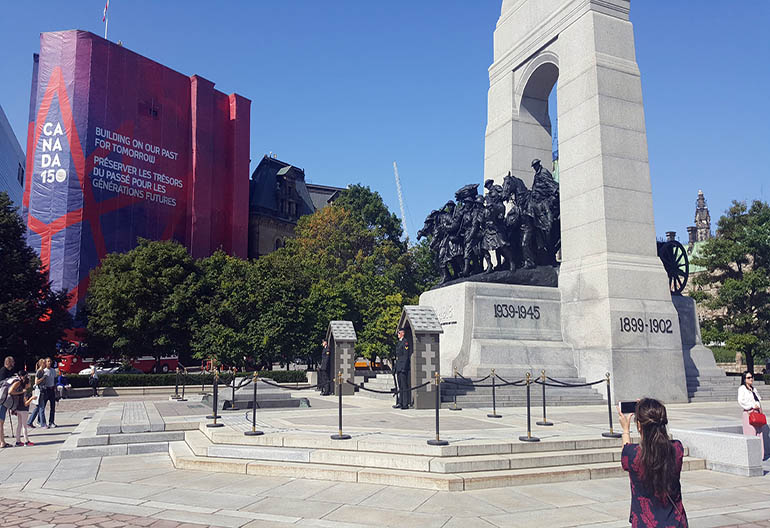 Tourist taking picture in National War Memorial